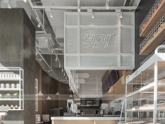 White Beverage Counter With Backlit Menu Wall