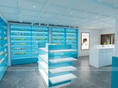 Aqua Blue Pharmacy Shelving and White Service Counter
