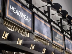 Black Cap Wall Rack Display with Checkout Sign
