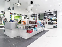 Black White Pharmacy Checkout Counter with Pendant Lights