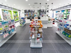 Black White Pharmacy Checkout Counter with Pendant Lights