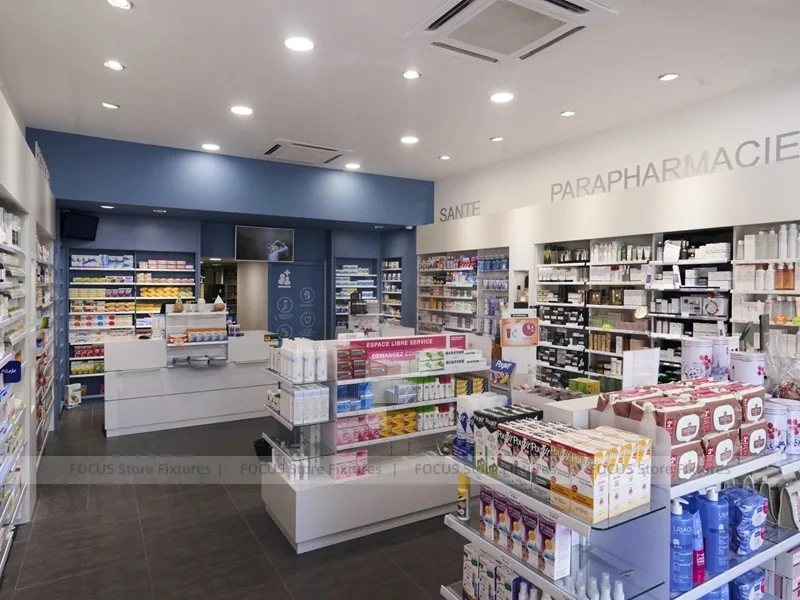 Blue Gray Pharmacy Checkout Counter and Wall Shelving