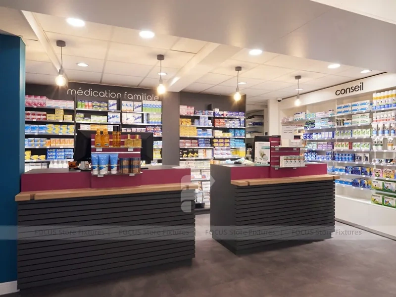 Blue Gray Pharmacy Checkout Counter and Wall Shelving