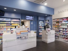 Blue Gray Pharmacy Checkout Counter and Wall Shelving