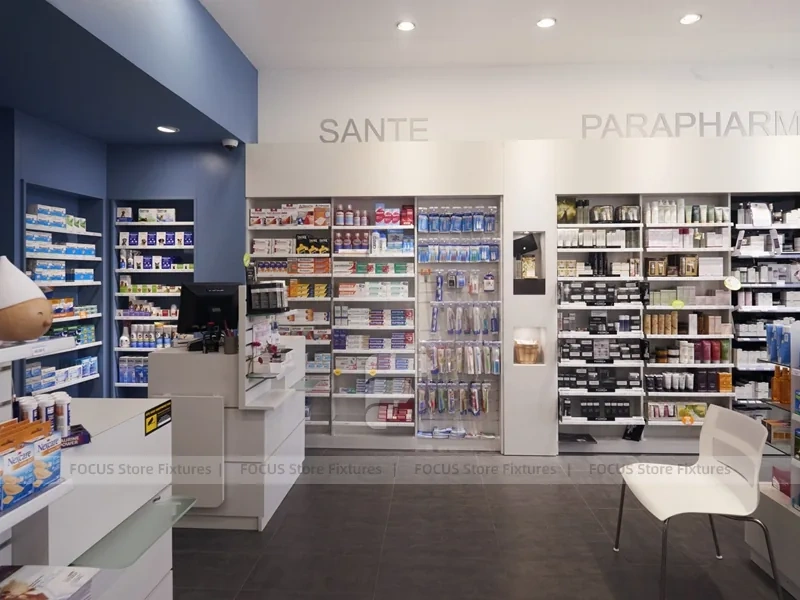 Blue Gray Pharmacy Checkout Counter and Wall Shelving