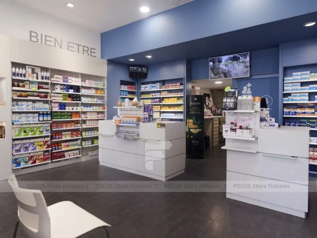 Blue Gray Pharmacy Checkout Counter and Wall Shelving