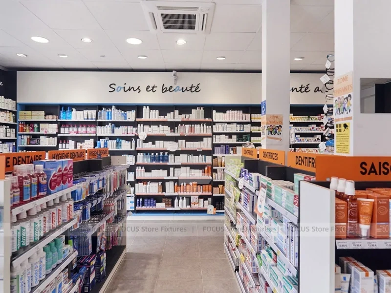 Blue White Pharmacy Aisle Shelving and Promo Gondola
