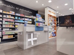 Blue White Pharmacy Aisle Shelving and Promo Gondola