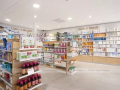 Blue White Pharmacy Aisle Shelving and Promo Gondola