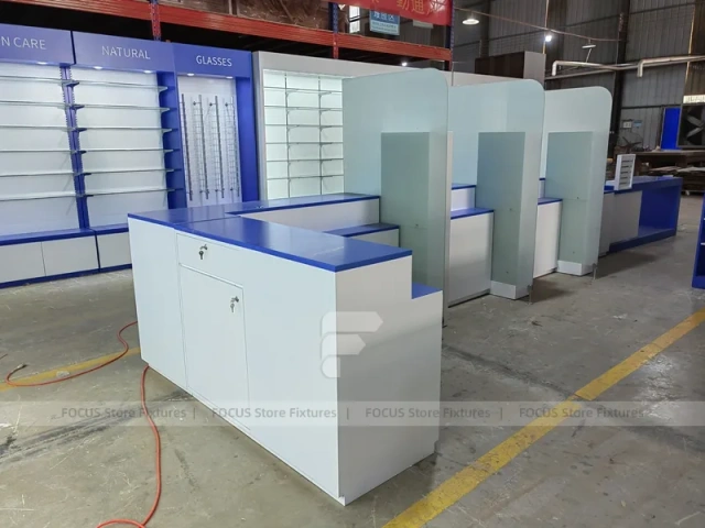 Blue White Pharmacy Checkout Counter and Gondola Fixtures