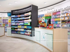 Colorful Pharmacy Wall Shelving with Round Display Table
