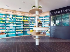 Colorful Pharmacy Wall Shelving with Round Display Table