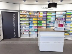 Curved Pharmacy Wall Shelving and Central Display Island