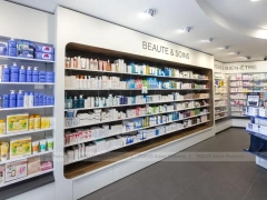 Curved Pharmacy Wall Shelving and Central Display Island