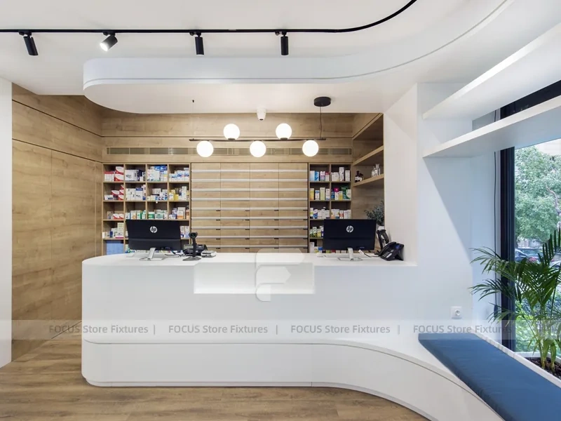 Curved White Pharmacy Counter with Wood Wall Shelving