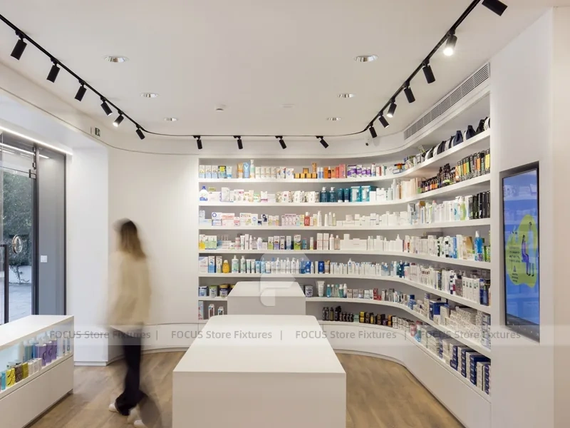 Curved White Pharmacy Counter with Wood Wall Shelving