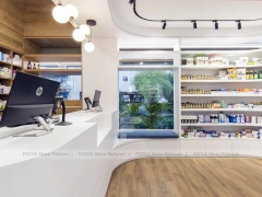 Curved White Pharmacy Counter with Wood Wall Shelving