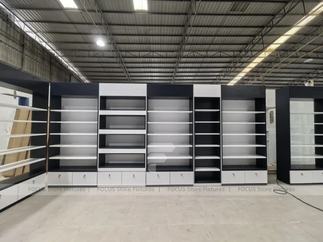 Dark Blue Pharmacy Counter and Wall Shelving Interior