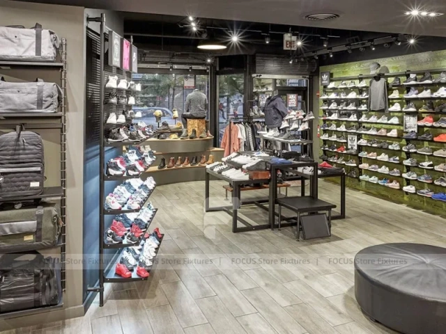 Dark Sneaker Wall Shelving and Apparel Display