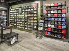 Dark Sneaker Wall Shelving and Apparel Display
