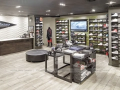 Dark Sneaker Wall Shelving and Apparel Display