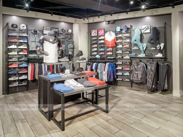 Dark Sneaker Wall Shelving and Apparel Display