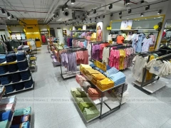 Girls Kidswear Wall Display with Colorful Dresses