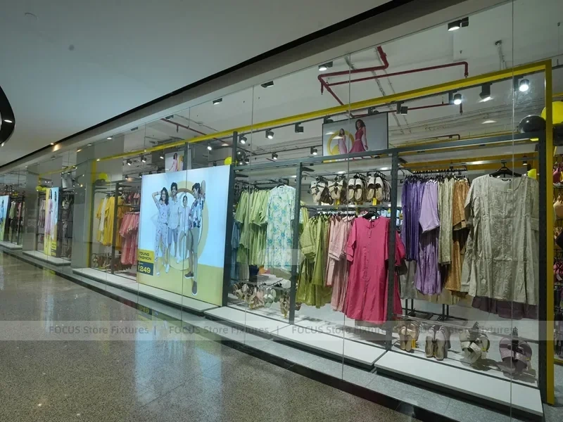 Girls Kidswear Wall Display with Colorful Dresses