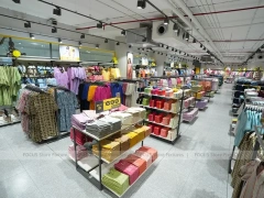 Girls Kidswear Wall Display with Colorful Dresses
