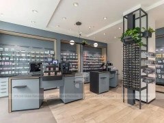 Gray Blue Pharmacy Wall Shelving with Plant Display