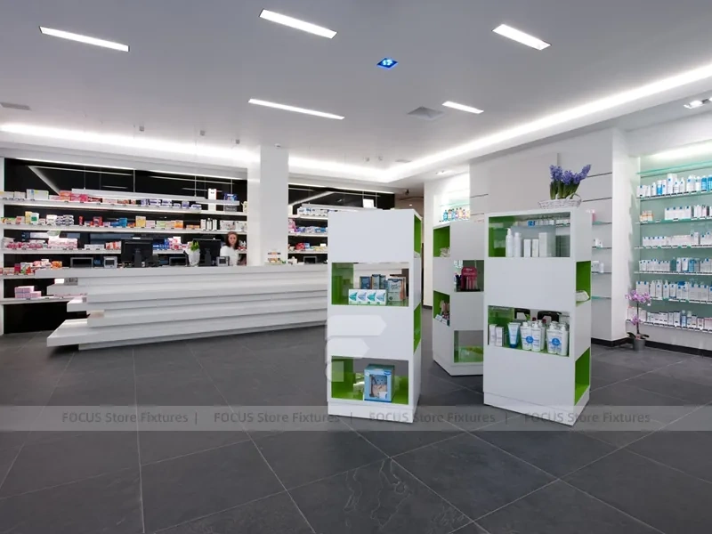 Gray White Pharmacy Counter and Illuminated Wood Shelves