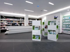 Gray White Pharmacy Counter and Illuminated Wood Shelves