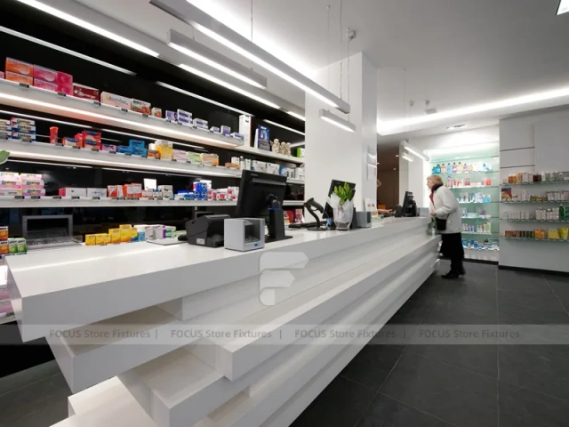 Gray White Pharmacy Counter and Illuminated Wood Shelves
