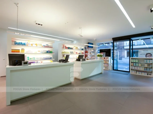 Gray White Pharmacy Counter and Illuminated Wood Shelves