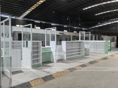 Green Accent Pharmacy Store Fixture Layout with Gondolas
