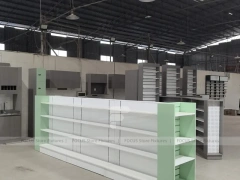 Green Accent Pharmacy Store Fixture Layout with Gondolas