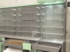 Green Accent Pharmacy Wall Shelving with Bench Displays