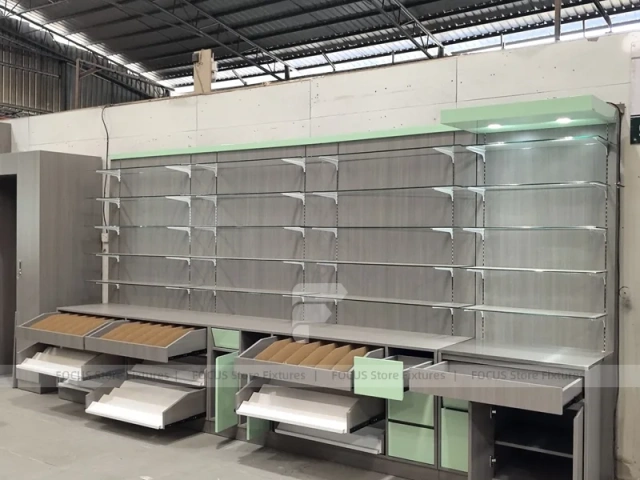 Green Accent Pharmacy Wall Shelving with Bench Displays