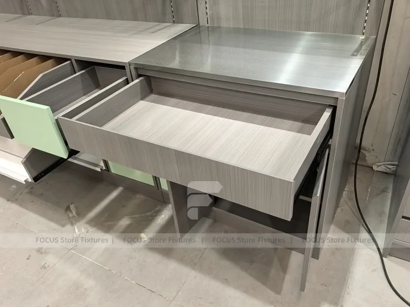Green Accent Pharmacy Wall Shelving with Bench Displays