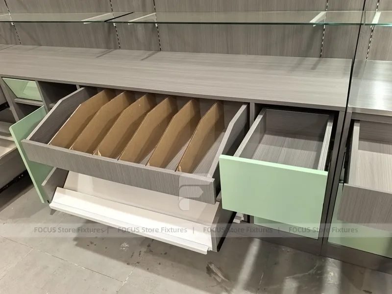 Green Accent Pharmacy Wall Shelving with Bench Displays