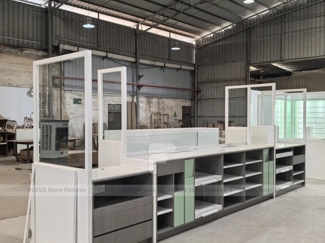 Green Accent Pharmacy Wall Shelving with Bench Displays