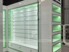 Green Backlit Pharmacy Wall Shelving Fixture