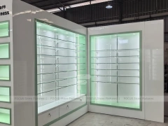 Green Backlit Pharmacy Wall Shelving Fixture