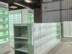 Green Backlit Pharmacy Wall Shelving Fixture