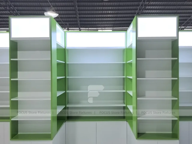 Green Framed Pharmacy Wall Shelving Fixture