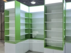 Green Framed Pharmacy Wall Shelving Fixture