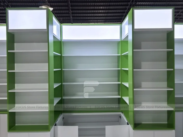Green Framed Pharmacy Wall Shelving Fixture