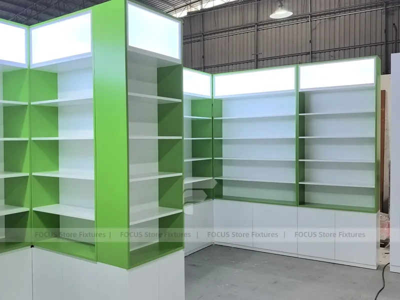 Green Framed Pharmacy Wall Shelving Fixture