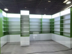 Green Framed Pharmacy Wall Shelving Fixture