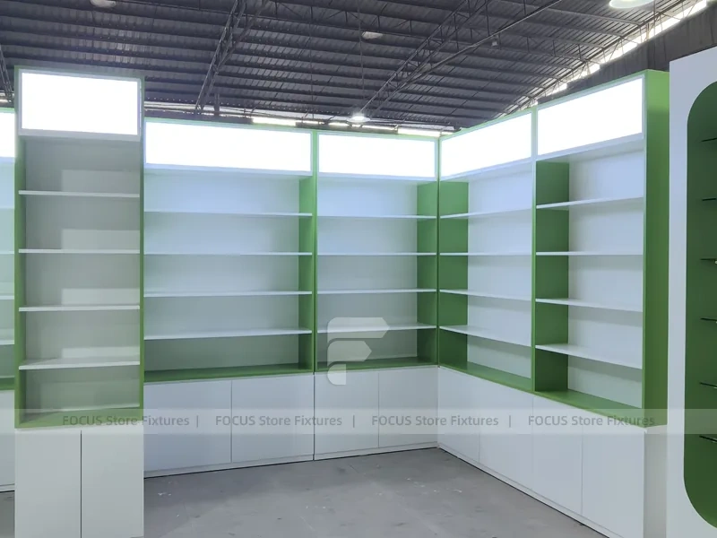 Green Framed Pharmacy Wall Shelving Fixture